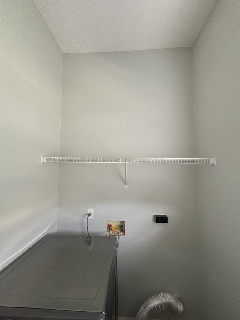 Home interior after — smooth, freshly painted walls and ceiling